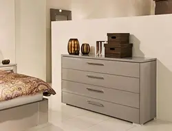 Tall chest of drawers in the bedroom photo