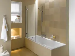 Photo of a bathtub with a tap in the middle