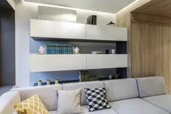 Шкаф за диваном в гостиной фото