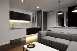 Черный диван в интерьере кухни