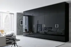 Черный шкаф в интерьере гостиной