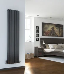 Вертикальный радиатор в интерьере гостиной
