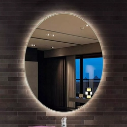 Круглое зеркало с подсветкой в ванную в интерьере