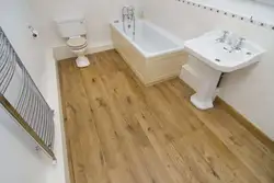 Vinyl laminate flooring in the bathroom photo