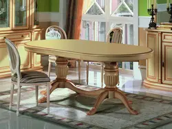 Овальный раздвижной стол в гостиной фото