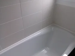 Photo of tile bathtub rim