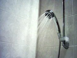 Photo of shower in bathtub with water