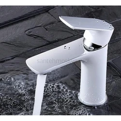 White bathroom sink faucet photo