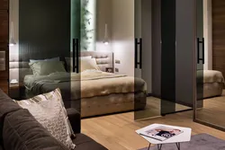 Glass partition in the bedroom interior