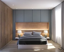 Bedroom design with built-in wardrobe and bed