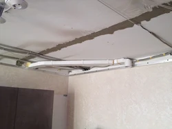 Вытяжка под натяжным потолком на кухне фото