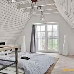 Дизайн мансарды с двускатной крышей спальня