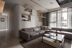 Дизайн гостиной с угловым диваном и стенкой