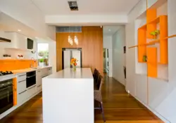 Orange living room kitchen photo