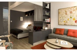 Zoning of a bedroom in a one-room apartment photo