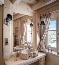 Интерьер ванной комнаты в деревянном доме