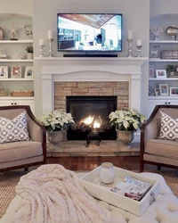 Фото гостиной с камином и телевизором в квартире