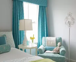 Turquoise curtains in the bedroom interior