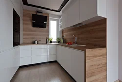 White corner kitchen with wooden countertop photo