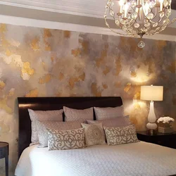 Bedroom with decorative plaster on the walls in the interior