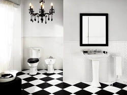 Bath design with dark tiles on the floor