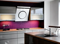 Kitchen design with an inclined hood in the interior