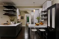 Kitchen photo with dark floor photo