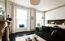 Интерьер квартиры студии с двумя окнами