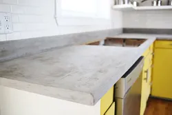 Столешница под бетон в интерьере кухни фото