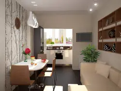 Photo of a living room kitchen in an apartment with a balcony