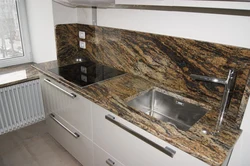 Ошхонаҳо бо аксҳои countertops сунъӣ