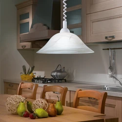 Chandelier above the dining table in the kitchen photo