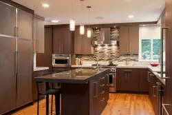 What color goes with brown in the kitchen interior photo