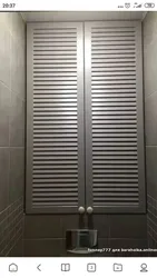 Жалюзийные двери в интерьере ванной