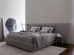 Дизайн спальни с мягким изголовьем фото