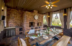 Kitchen in the country with barbecue photo