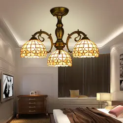 Photo chandeliers low in the bedroom