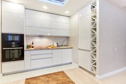 Kitchen with high upper cabinets photo