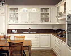 White wooden kitchen in the interior photo