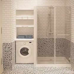 Bathroom interior with shower and washing machine