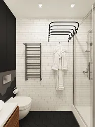 Черный полотенцесушитель в ванной дизайн
