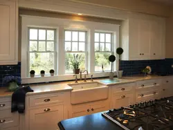 Kitchen design with kitchen unit by the window