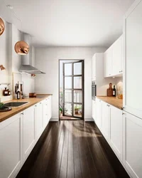 Дизайн узкой кухни с окном на всю стену