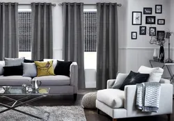Серые шторы в интерьере гостиной с серой мебелью фото