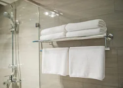 Полотенца в интерьере ванной комнаты фото