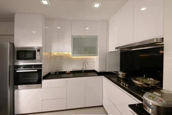 Glossy corner kitchen photo