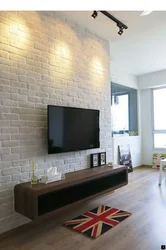Дизайн гостиной с кирпичом на одной стене