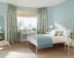 Blue wallpaper in the bedroom interior what kind of curtains