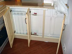 Cabinet in the window sill in the kitchen photo