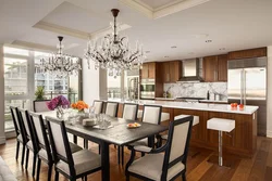 Chandelier in the kitchen living room in a modern style in the interior